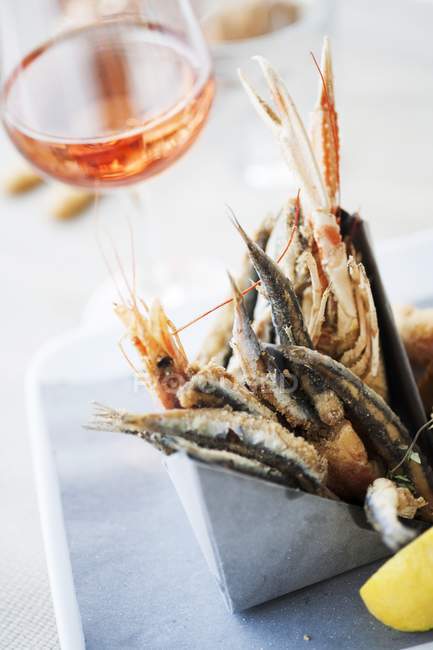 Deep-fried fish and langoustine — Stock Photo