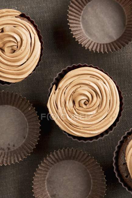Chocolate cupcakes with coffee icing — Stock Photo