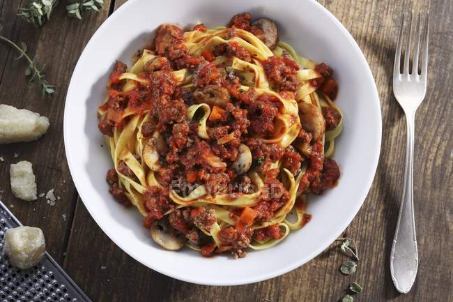Tagliatelle pasta with bolognese sauce — Stock Photo
