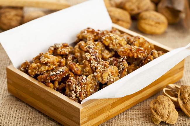 Sugared walnuts with sesame — Stock Photo