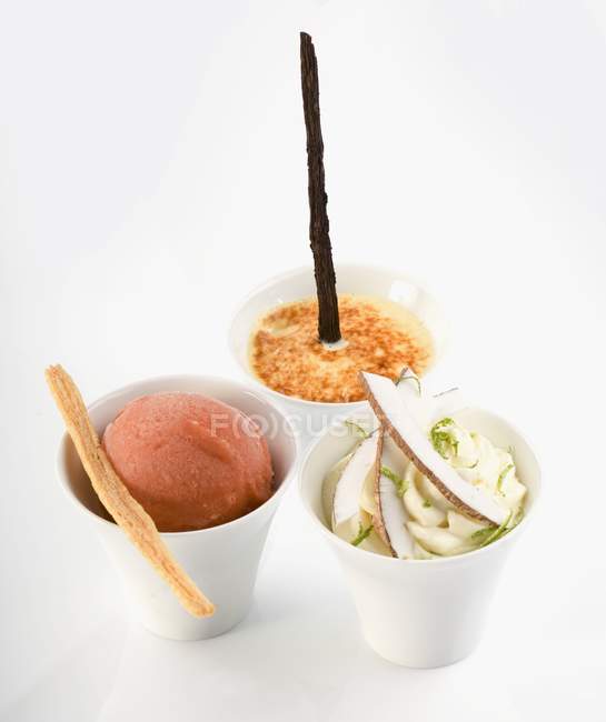 Trio of desserts in cups — Stock Photo