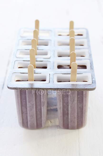 Home-made chocolate ice lollies — Stock Photo