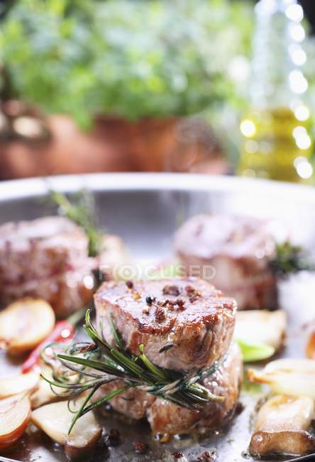 Fried pork fillets with rosemary — Stock Photo