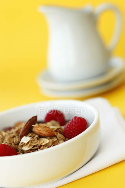 Bowl of granola with almonds — Stock Photo
