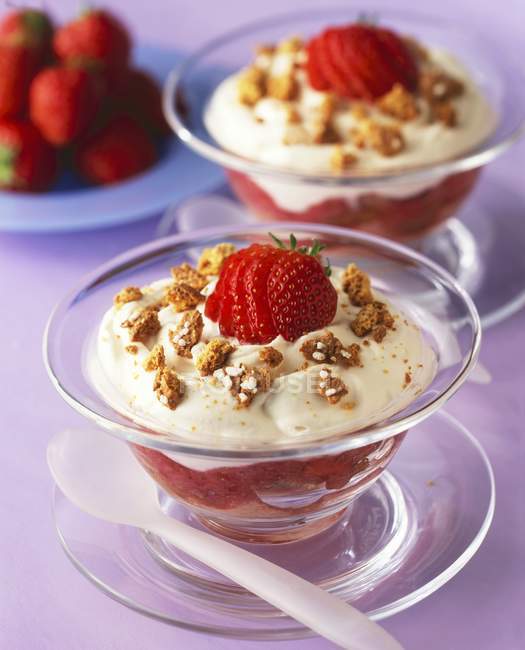 Closeup view of strawberry fool topped with cream — Stock Photo