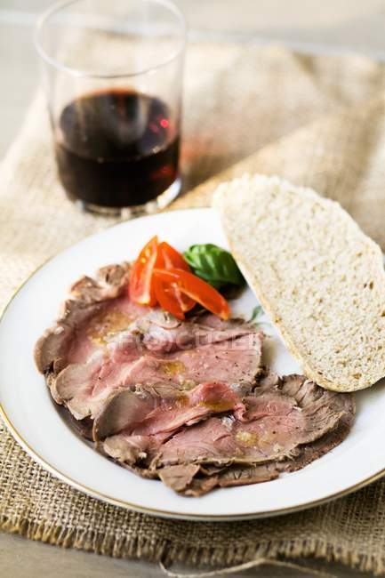 Sliced Roasted beef in plate — Stock Photo