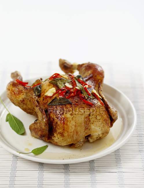Barbecued chicken with sage — Stock Photo