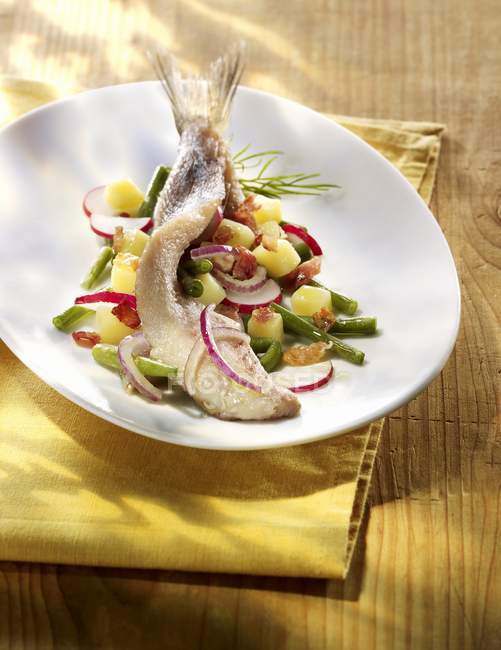 Herring with potato salad and green beans — Stock Photo