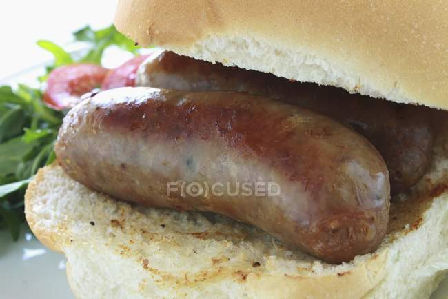 Bread roll with sausage — Stock Photo