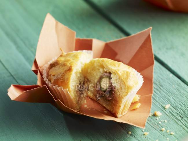 Muffin filled with anchovies — Stock Photo