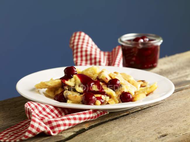 Kaiserschmarren pancakes with cherry compote — Stock Photo