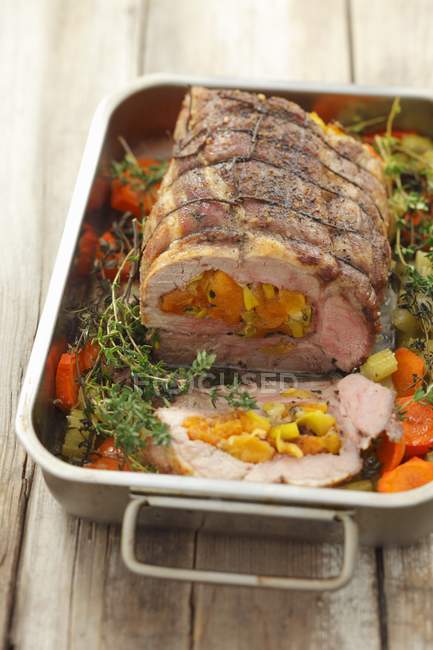 Pork neck with apricots — Stock Photo