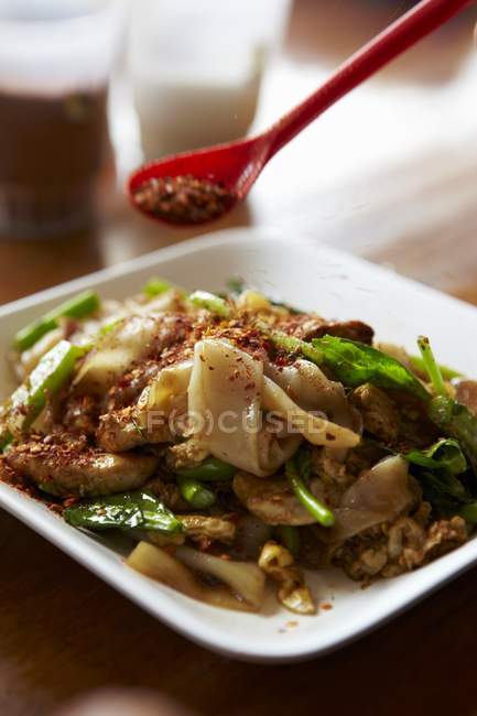 Noodles with beef and chili — Stock Photo
