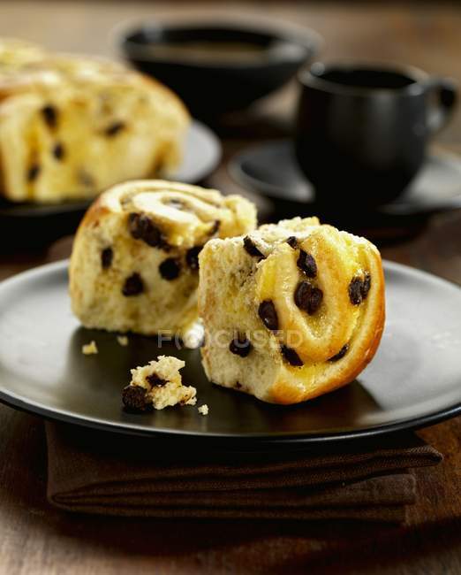 Closeup view of chocolate chip Brioche pieces on plate — Stock Photo