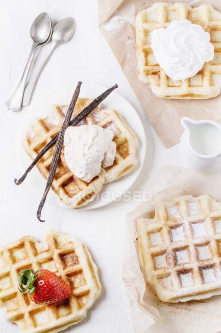 Belgian waffles served with ice cream — Stock Photo