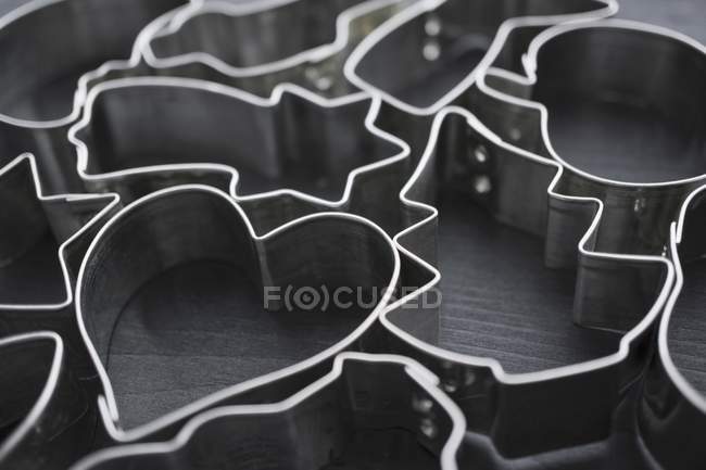 Closeup view of various Christmas cookie cutters — Stock Photo