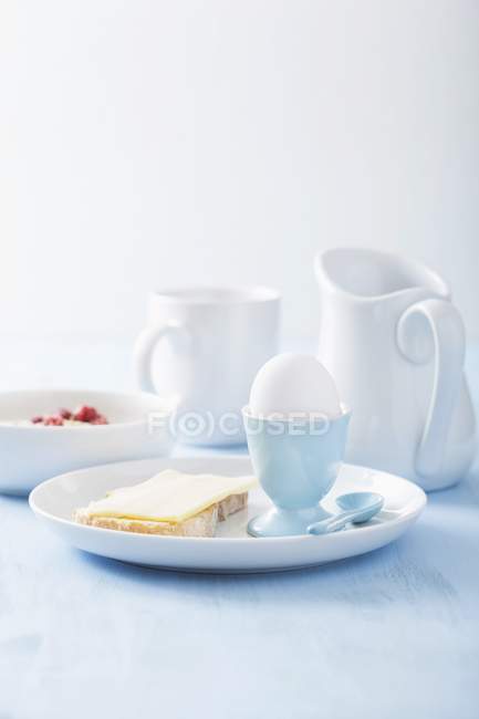 Breakfast with egg and muesli — Stock Photo