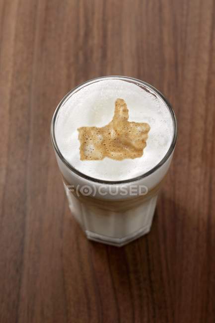 Latte macchiato with Like symbol — Stock Photo