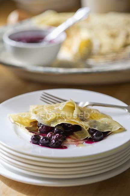 Pancakes with blueberries and fork — Stock Photo