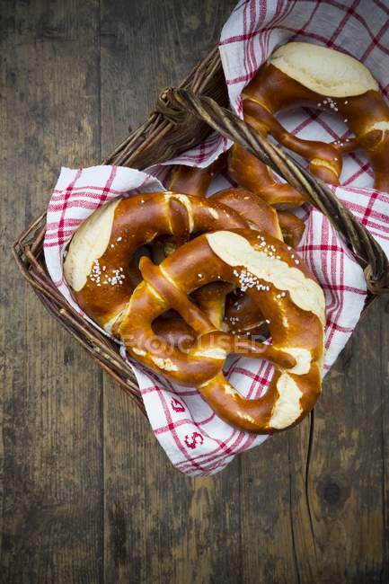 Pretzels falling out of a basket — Stock Photo