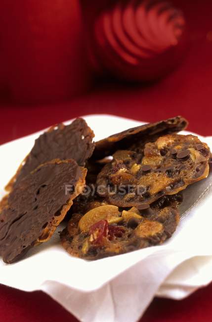 Closeup view of Florentines with chocolate and dry fruit on plate — Stock Photo