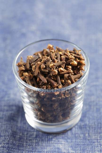 Glass of Cloves seeds — Stock Photo