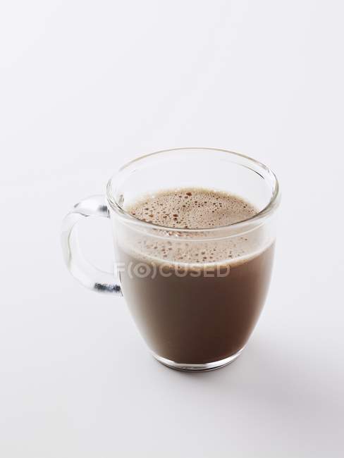Closeup view of cocoa in glass cup — Stock Photo