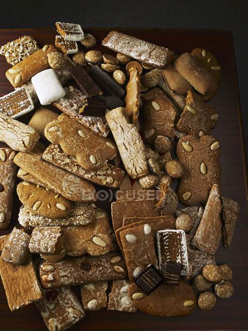 Variety of gingerbread on black — Stock Photo