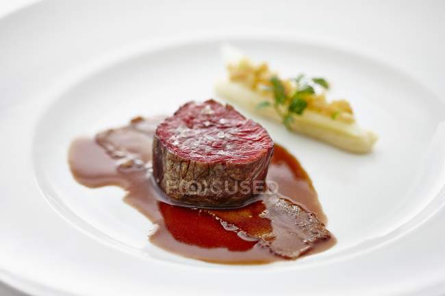 Beef medallion with bacon and asparagus — Stock Photo