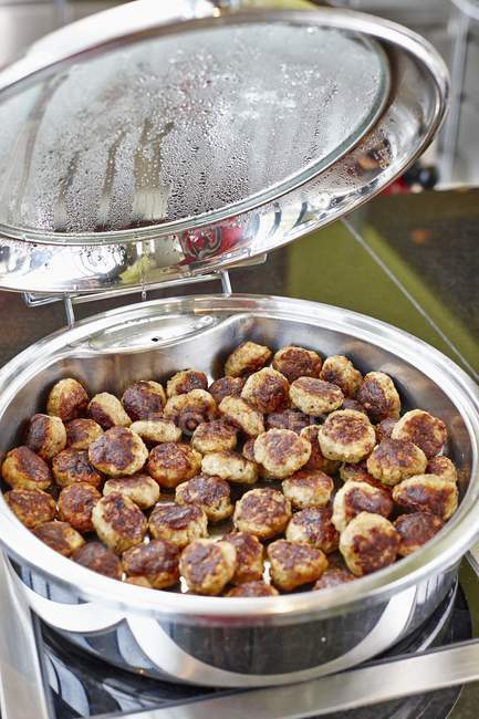 Meatballs in steamer on table — Stock Photo