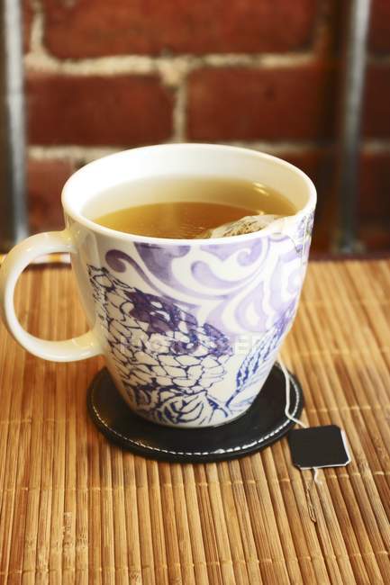 Cup of green tea — Stock Photo