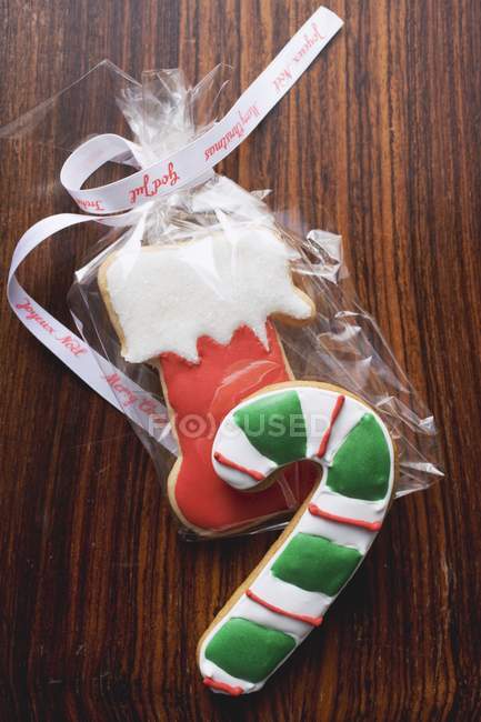 Christmas biscuits on wooden surface — Stock Photo