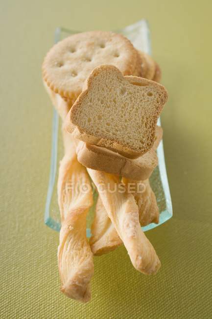 Crackers zwieback and bread sticks — Stock Photo