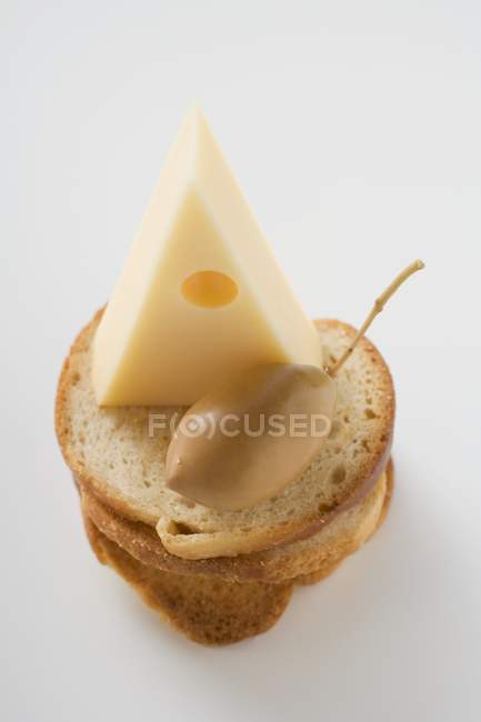 Emmental cheese and olive — Stock Photo