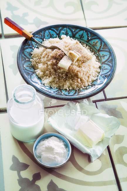 Couscous and dairy products — Stock Photo