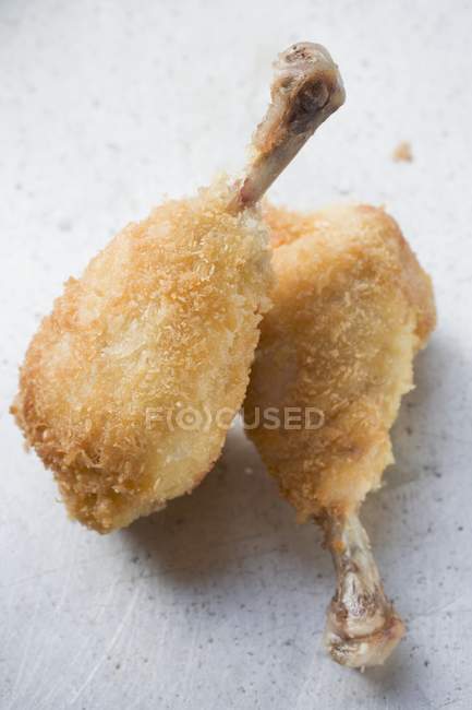 Breaded chicken legs — Stock Photo