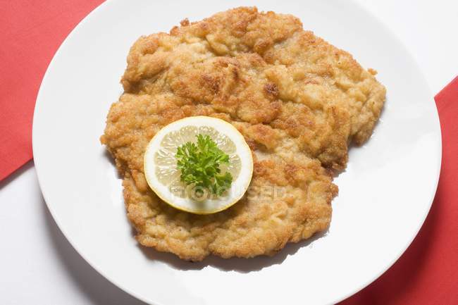 Veal escalope with lemon — Stock Photo