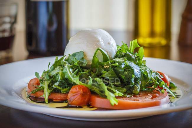Tomato salad with mozzarella — Stock Photo