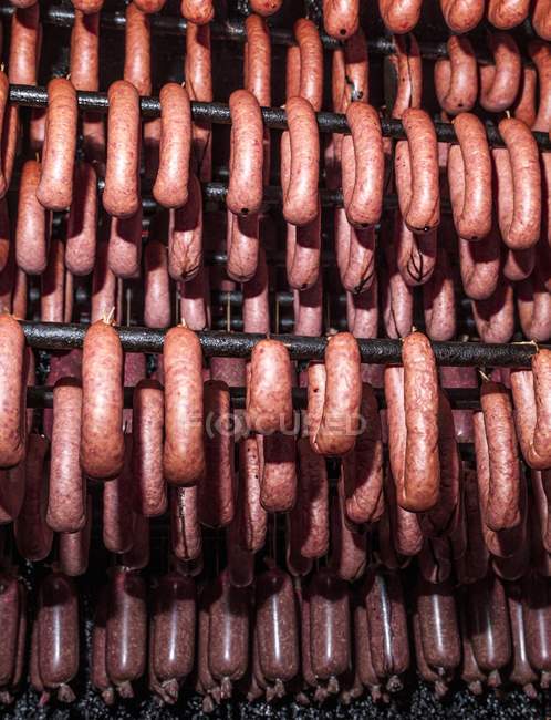 Meat Sausages hanging — Stock Photo