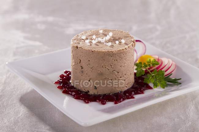 Closeup view of goose liver pate with cranberries — Stock Photo