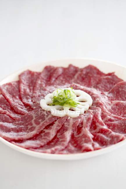 Wagyu beef slices with lotus root — Stock Photo