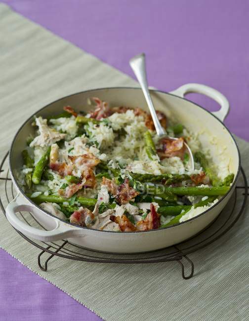 Asparagus risotto rice with chicken — Stock Photo