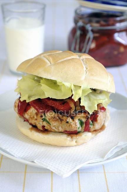 Chicken burger with roasted pepper — Stock Photo