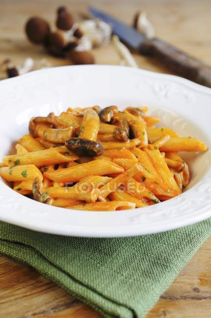 Penne pasta with wild mushrooms — Stock Photo