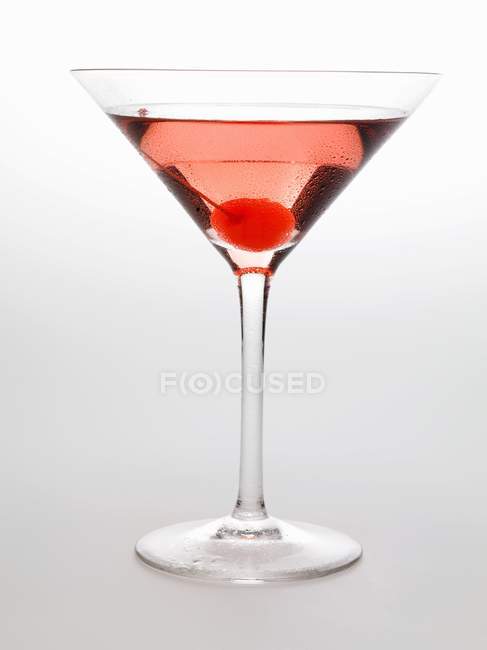 Cosmopolitan with cocktail cherry — Stock Photo
