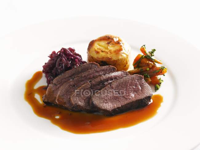 Roast venison with cabbage — Stock Photo
