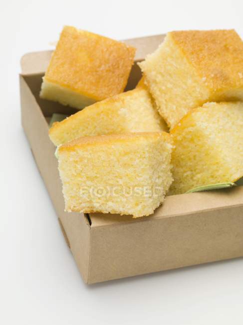 Cornbread in cardboard box — Stock Photo