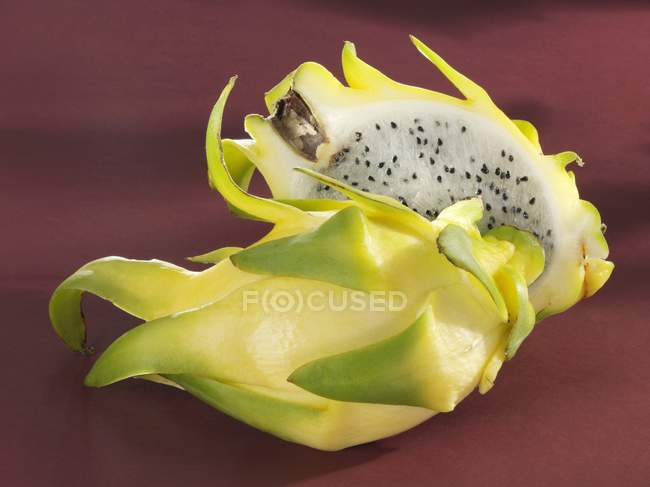 Halved yellow pitahaya — Stock Photo