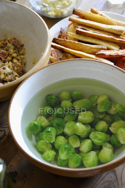 Brussels sprouts in bowl — Stock Photo