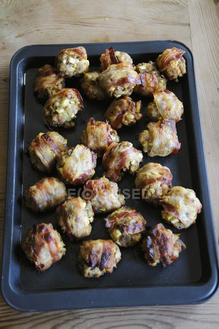 Meatballs wrapped in bacon — Stock Photo